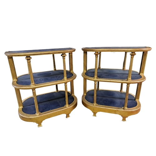 377 - A PAIR OF 19TH CENTURY GILTWOOD OPEN FRONT SIDE CABINETS each of rectangular bowed outline the shape... 