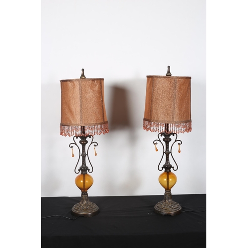 412 - **WITHDRAWN** A PAIR OF CONTINENTAL BRONZED AND GILT TABLE LAMPS each with spiral twist and bulbous ... 