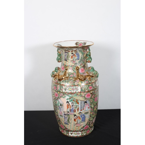 417 - A CHINESE FAMILLE ROSE VASE decorated overall with birds, figures, flowerheads and foliage with gilt... 