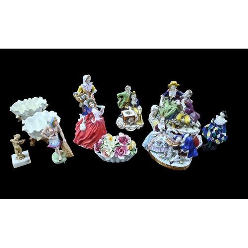 482 - A COLLECTION OF CHINA FIGURES to include Royal Doulton, a set of four Continental Moor China bowls o... 