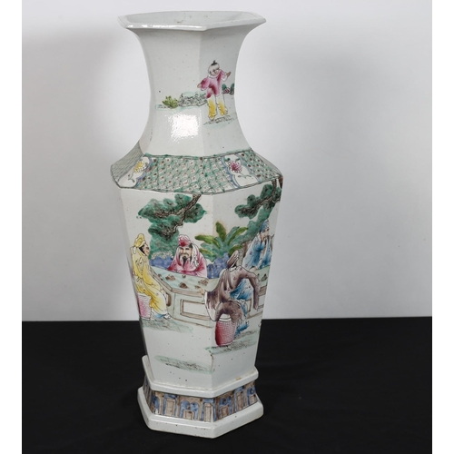 491 - A PAIR OF PORCELAIN FAMILLE ROSE VASES the white and turquoise ground decorated with figures in a la... 