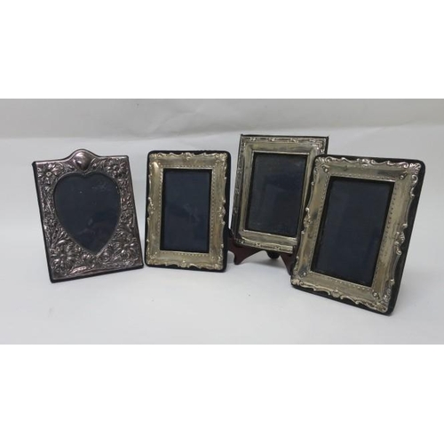 A Collection Of Nine Silver Embossed Photo Frames