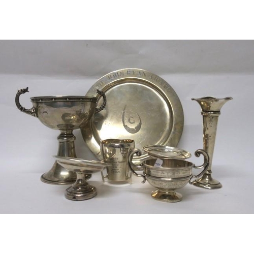 510 - A COLLECTION OF SILVER to include a Celtic pattern chalice, a silver loving cup, a silver salver ins... 