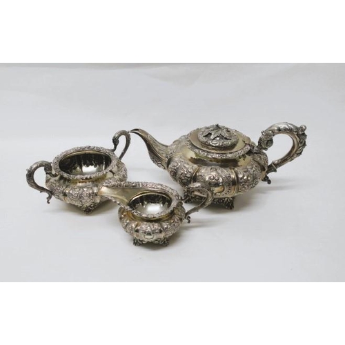 515 - A GEORGIAN IRISH SILVER EMBOSSED THREE PIECE TEA SET for J. Mahony Dublin 1834
60 troy ounces