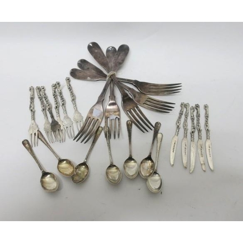 518 - FIVE ODD SILVER FORKS (marks rubbed), an eleven piece silver fruit set comprising six forks, five kn... 