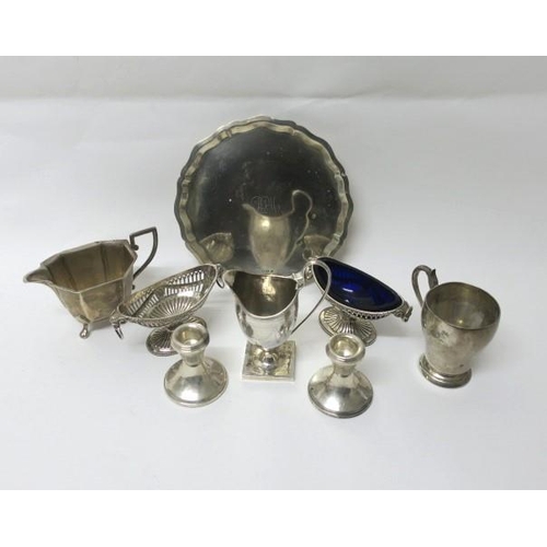 527 - A COLLECTION OF SILVER to include a Sheffield salver 1960, a pair of silver Adam design salts (one l... 