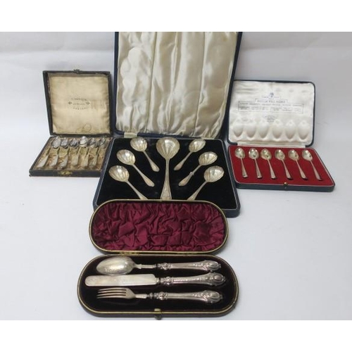 554 - A SILVER THREE PIECE CHRISTENING SET in cast Birmingham 1891, six silver coffee spoons in case Sheff... 