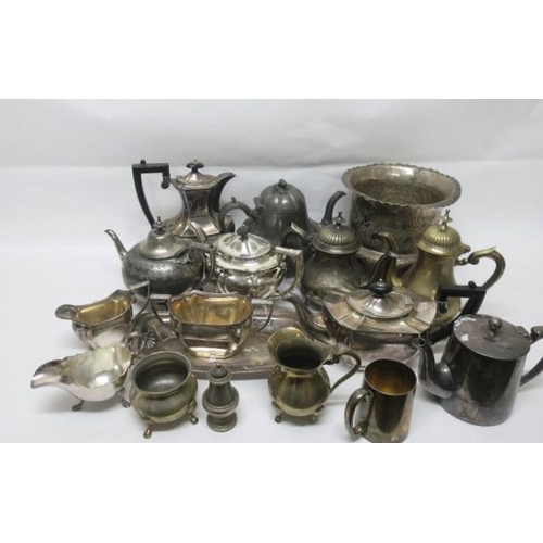 560 - A COLLECTION OF PLATED WARE to include teapots, coffee pots, cream jugs, etc.