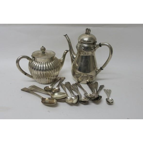 564 - A CONTINENTAL SILVER COFFEE POT together with a continental silver teapot 30 troy ounces and three b... 