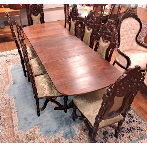 63 - A NINE PIECE MAHOGANY DINING ROOM SUITE comprising eight continental mahogany and upholstered dining... 