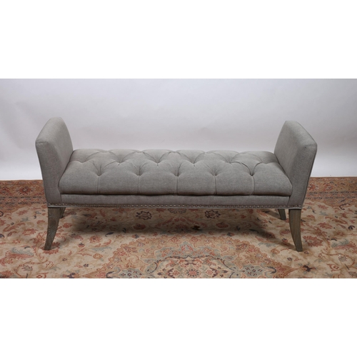 645 - A GREY PAINTED AND UPHOLSTERED DUET STOOL of rectangular outline the buttoned upholstered seat on sa... 