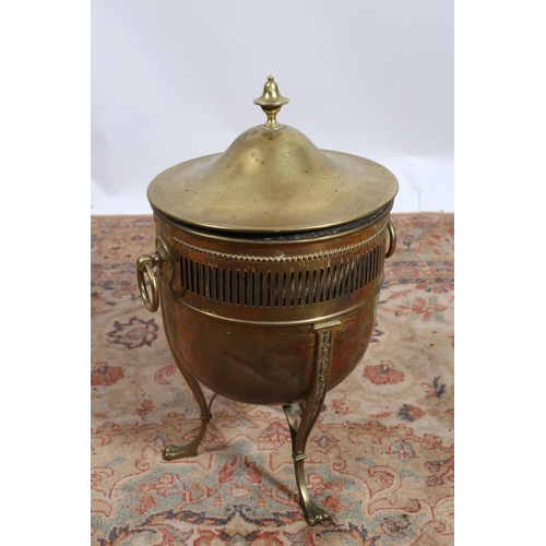 82 - **WITHDRAWN** A VINTAGE BRASS FUEL BIN of cylindrical tapering form with pierced apron and brass rin... 