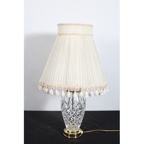 115 - A CUT GLASS AND PLATED TABLE LAMP of bulbous form with shade, A BRASS TABLE LAMP the octagonal colum... 