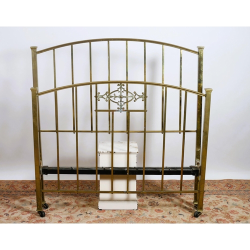 88 - A 19TH CENTURY BRASS BED the rectangular arched headboard with square barring and conforming footboa... 