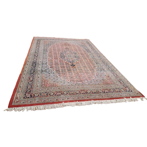 524 - A BIDJAR WOOL RUG the light blue, wine and beige ground with central panel filled with stylised flow... 