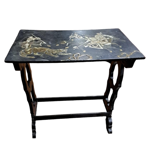 387 - A JAPANESE STYLE BLACK LACQUERED AND GILT TABLE of rectangular outline the shaped top depicting warr... 