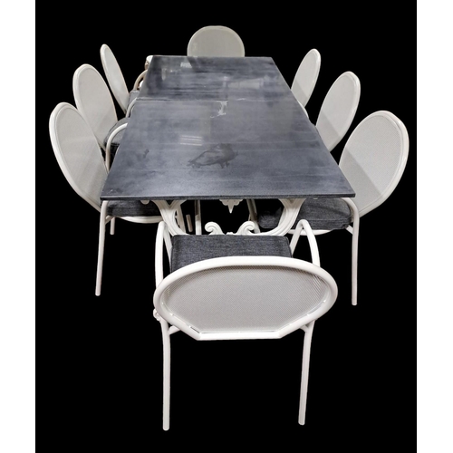 401 - A NINE PIECE CAST IRON MARBLE AND TUBULAR PATIO SUITE comprising eight elbow chairs the pierced meta... 