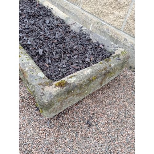 415 - A 19TH CENTURY LIMESTONE TROUGH of rectangular outline 
22cm (h) x 100cm (w) x 42cm (d)