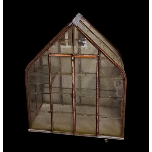 416 - A VINTAGE CAST IRON AND GLAZED GREENHOUSE of rectangular arched form the shaped top above a pair of ... 