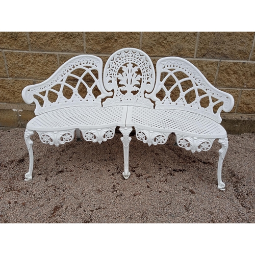 419 - A CAST ALUMINIUM TRIPLE CHAIR BACK BENCH the serpentine shaped back with pierced lattice work and fo... 