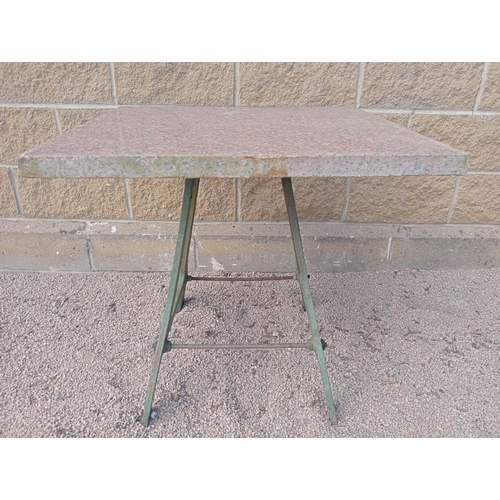 422 - A VINTAGE CAST IRON AND MARBLE TABLE of rectangular outline the veined marble top raised on a cast i... 