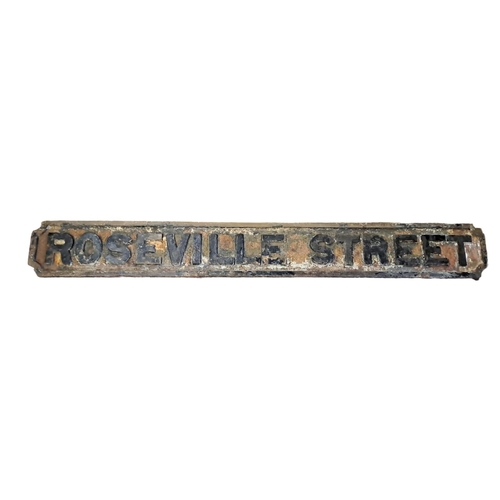 431 - A 19TH CENTURY CAST IRON STREET SIGN inscribed 'Roseville Street' 
14cm (h) x 106cm (w)