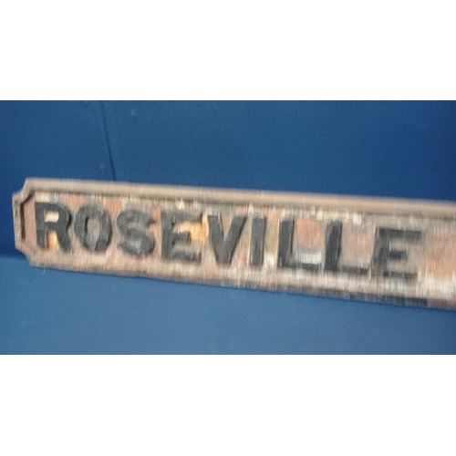 431 - A 19TH CENTURY CAST IRON STREET SIGN inscribed 'Roseville Street' 
14cm (h) x 106cm (w)