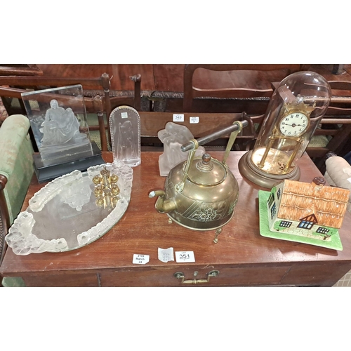 474 - A MISCELLANEOUS COLLECTION to include a brass clock in glass dome, a brass embossed teapot on stand,... 