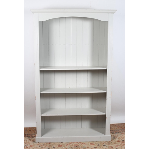 52 - A GREY PAINTED OPEN FRONT BOOKSHELF of rectangular outline the moulded cornice with arched frieze ab... 