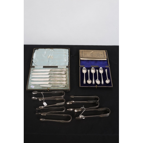 538 - A CASED SET OF SIX SILVER TEASPOONS, a case of five silver fruit knives together with seven various ... 