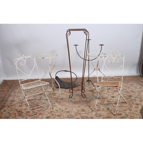 557 - FOUR VINTAGE WROUGHT IRON FOLDING GARDEN CHAIRS, a three branch candelabrum, plant stand, lantern, e... 