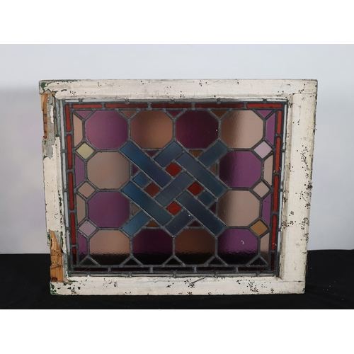 562 - TEN VINTAGE LEAD GLASS AND STAINED GLASS WINDOWS in pine painted frames 
Six 58cm (h) x 68cm (w) 
Fo... 