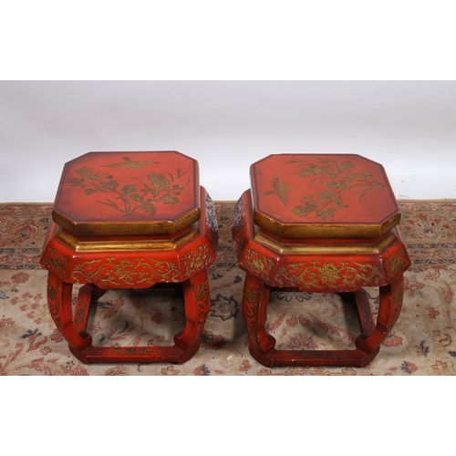 64 - A PAIR OF CHINESE RED LACQUERED AND GILT TABLES decorated overall with flowerheads, foliage and bird... 