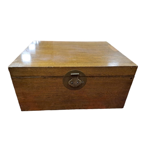 7 - A VINTAGE OAK TRUNK of rectangular outline the hinged lid with brass clasp
47cm (h) x 100cm (w) x 79... 