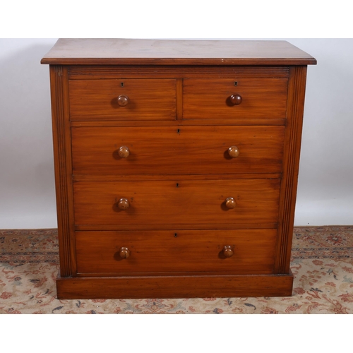 183 - A VINTAGE SATIN BIRCH CHEST of rectangular outline the shaped top above two short and three long gra... 