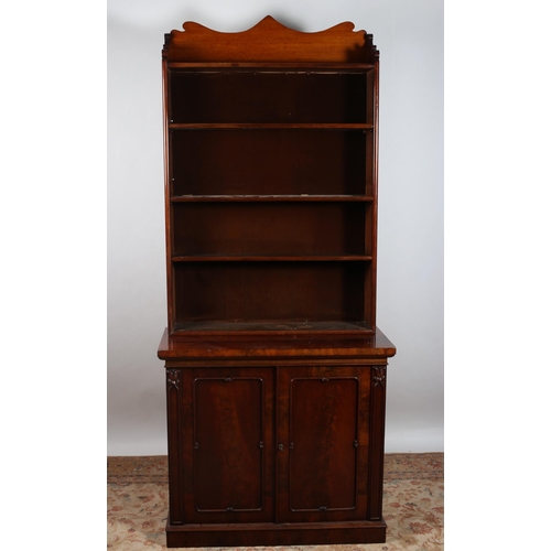 188 - A 19TH CENTURY MAHOGANY OPEN FRONT BOOKCASE the superstructure with moulded gallery above five open ... 