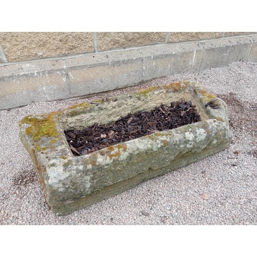 411 - A 19TH CENTURY SANDSTONE TROUGH of rectangular outline
22cm (h) x 78cm (w) x 33cm (d)