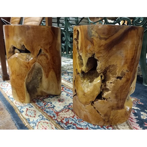 393 - A PAIR OF WALNUT STOOLS each of naturalistic form 
Each 40cm (h) x 30cm (d)