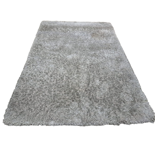 633 - A SILVER SHAGGY PILE RUG 200cm (l) x 290cm (w) together with A BLUE SHAGGY PILE RUNNER 490cm (l) x 8... 