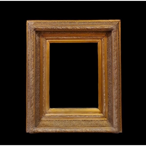 153 - A CONTINENTAL GILT FRAME MIRROR the rectangular bevelled glass plate within a foliate and flowerhead... 