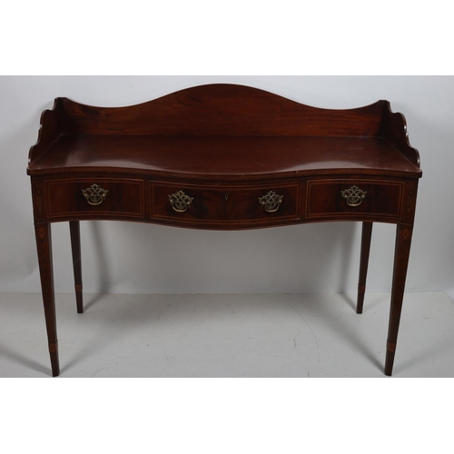 393 - A FINE 19TH CENTURY SHERATON DESIGN MAHOGANY SIDE TABLE of serpentine outline the shaped top with mo... 