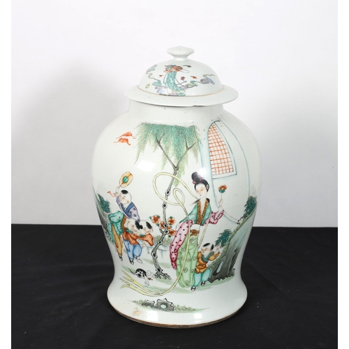 439 - A 19TH CENTURY CHINESE LIDDED VASE of baluster form the white ground decorated overall with figures ... 