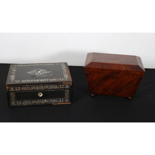 440 - A 19TH CENTURY MAHOGANY TEA CADDY of sarcophagus outline the hinged lid containing zinc lidded compa... 