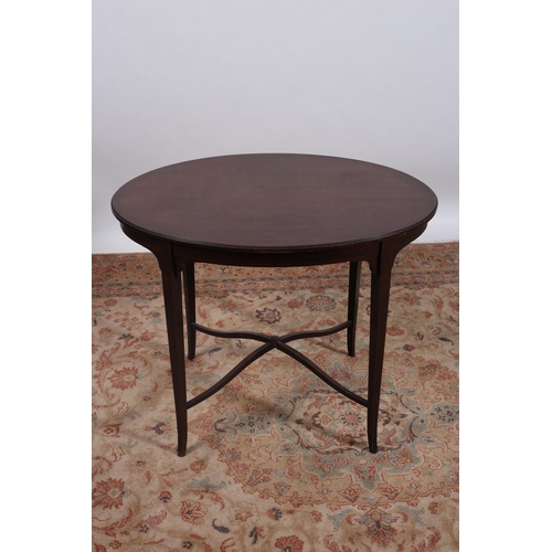 643 - A VINTAGE MAHOGANY AND SATINWOOD INLAID TABLE of oval outline the shaped top raised on square taperi... 