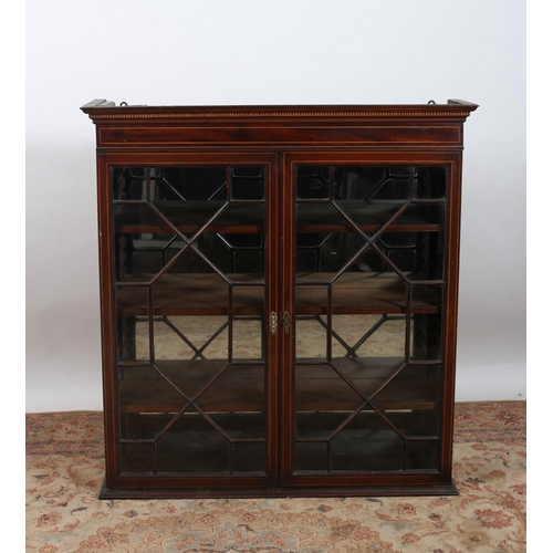 169 - A GEORGIAN MAHOGANY AND SATINWOOD INLAID BOOKCASE TOP the moulded cornice above a pair of astragal g... 