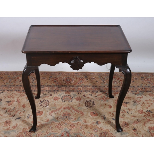 175 - A 19TH CENTURY MAHOGANY IRISH SILVER TABLE the rectangular dished top above a shaped apron with shel... 