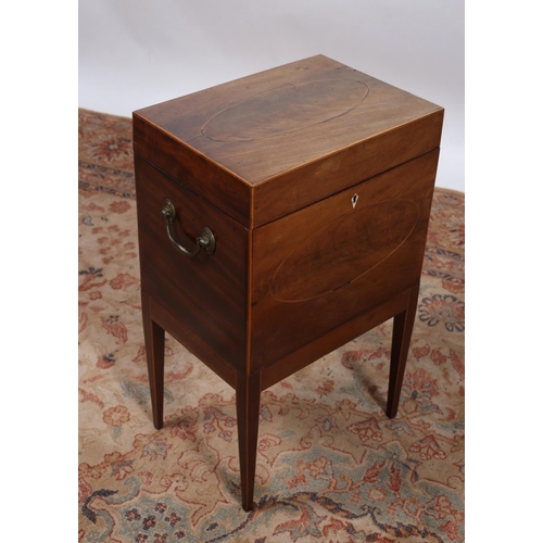 180 - A 19TH CENTURY MAHOGANY AND SATINWOOD INLAID CELLARETTE of square outline the shaped top with hinged... 