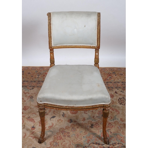 183 - A 19TH CENTURY GILTWOOD AND UPHOLSTERED SIDE CHAIR the scroll over back with upholstered panel and s... 