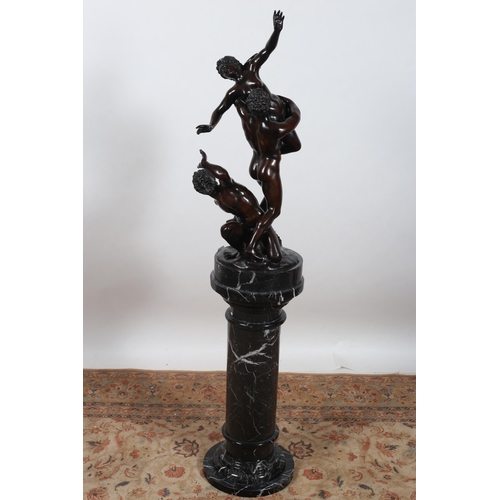 189 - after GIAMBOLOGNA
A fine cast bronze group modelled as two males, one holding a naked female shown s... 