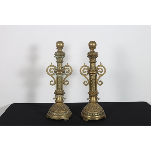 208 - A PAIR OF 19TH CENTURY BRASS COLUMNS each with a spherical capital above an engraved column with pie... 